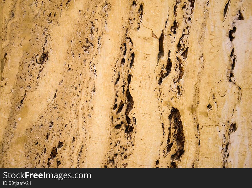 Beige stone wall texture with big gaps