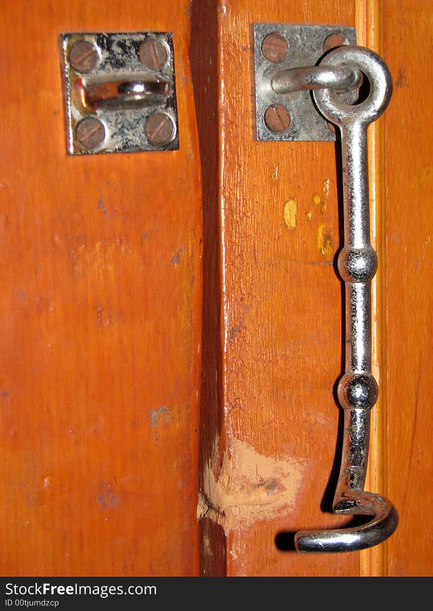 Open door and a old fashion hook