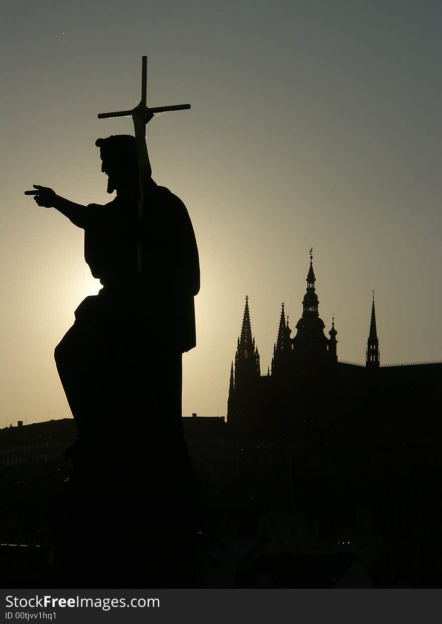 Silhouette statue with Prague Castle. Silhouette statue with Prague Castle.