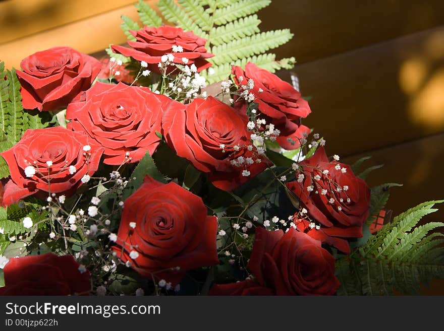 Bunch of red roses at sunlight