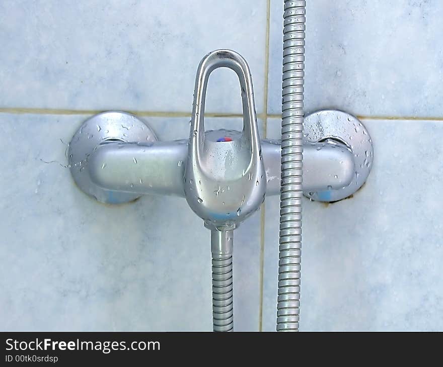 Hot or cold water control in the shower.