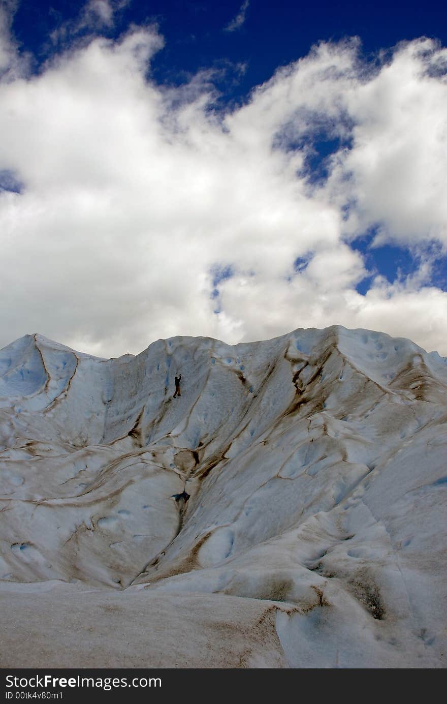 Man climbering on the Perito Moreno glacier