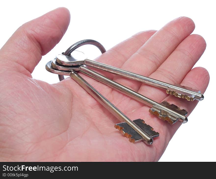 Bunch of keys in the arm isolated on white