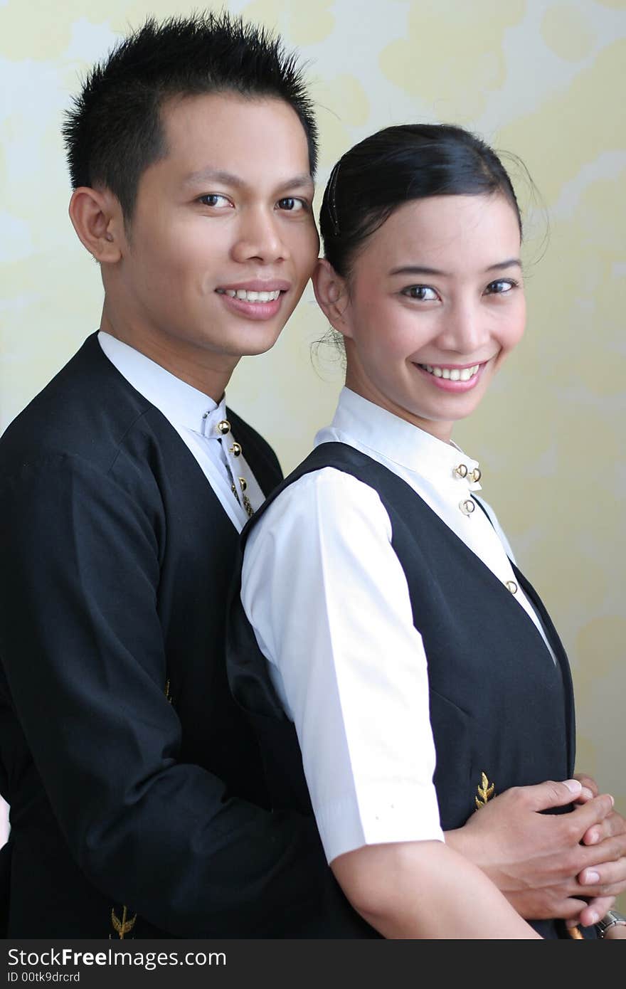 Photograph of two restaurant staff. Photograph of two restaurant staff