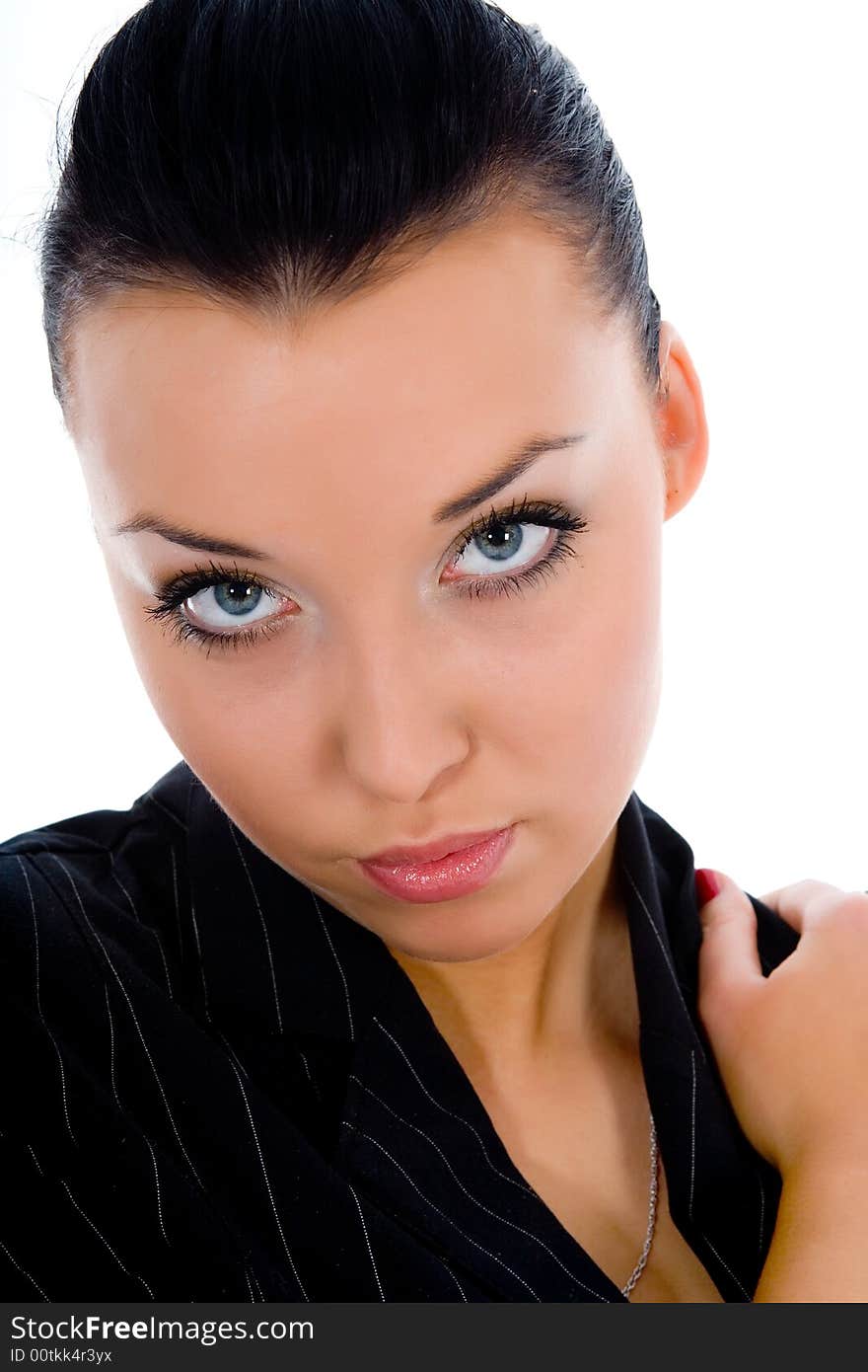 Portrait of the brunette with blue eyes on white background