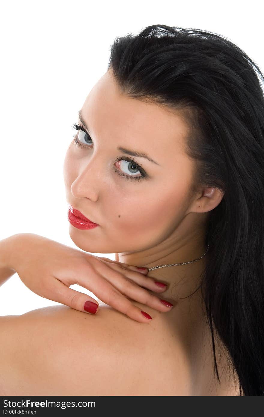 Portrait of the brunette with blue eye on white background