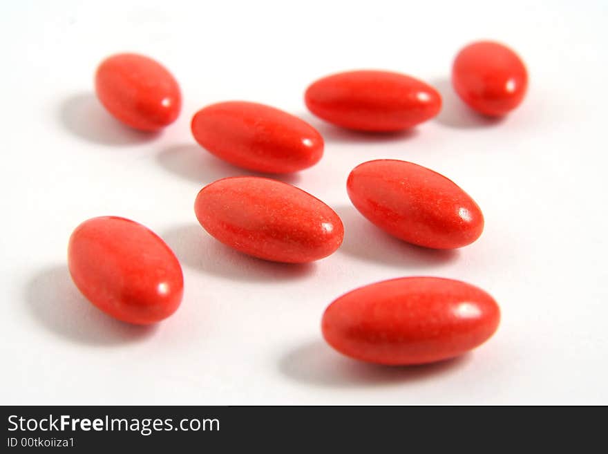 A few medicine tablets on a table