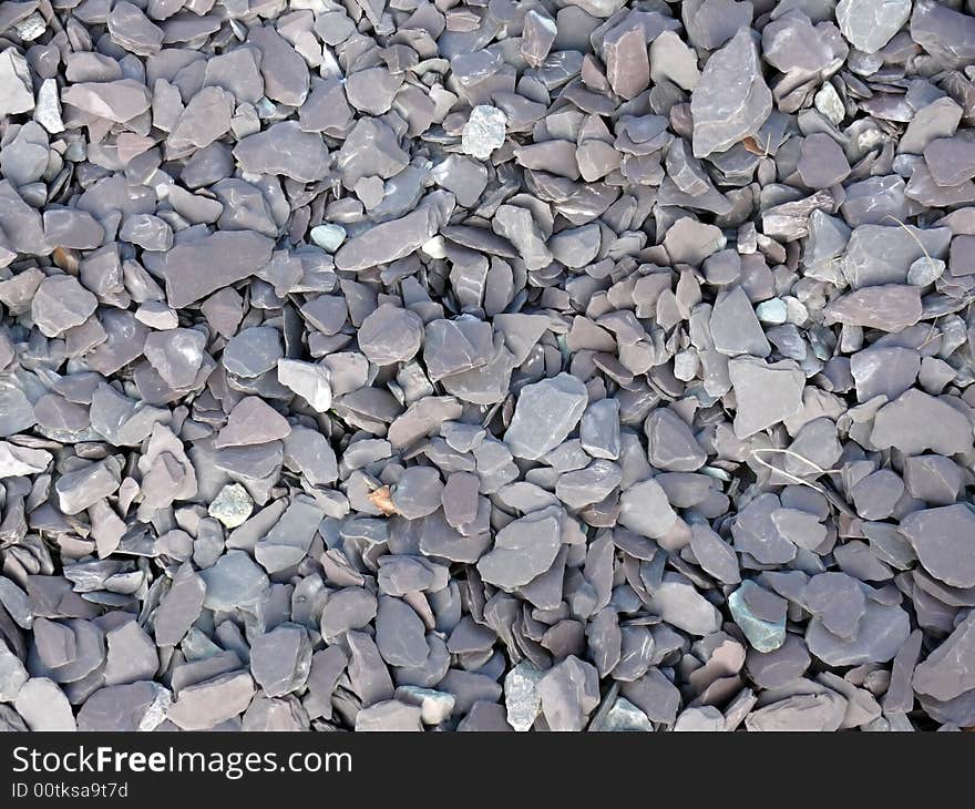 Portrait of smashed rock background. Portrait of smashed rock background