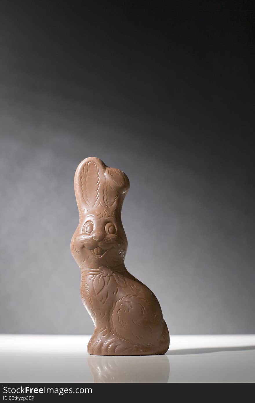 Chocolate easter bunny / sweet bunny on the black background