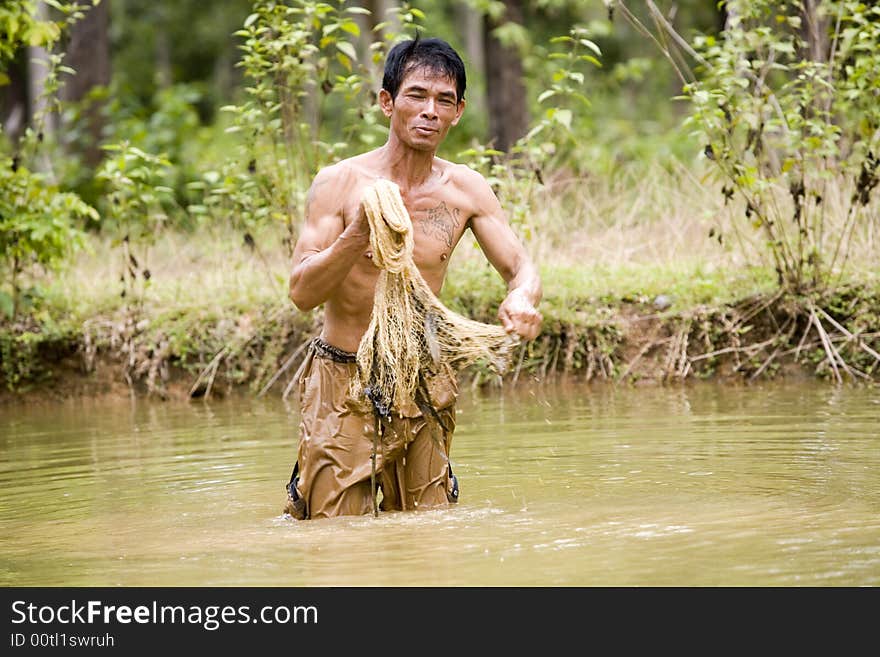 Fishing with a throw net