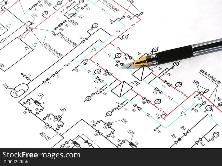 Ball pen on a background of the drawing on a white paper. Ball pen on a background of the drawing on a white paper