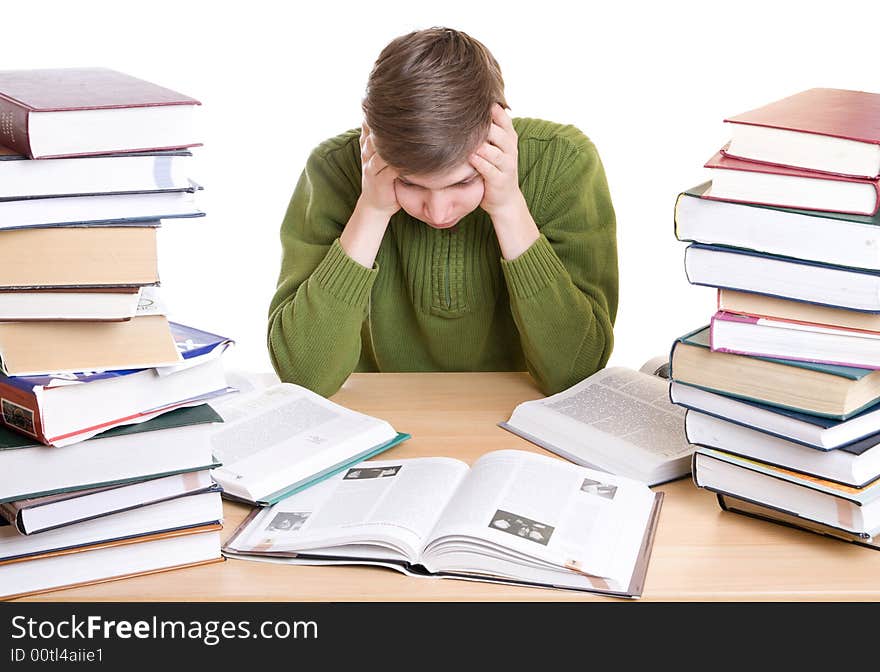 The young student with books isolated on a white background