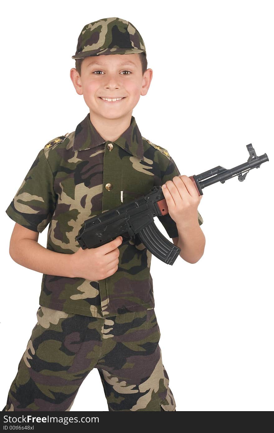 Young boy hold gun isolated on white background