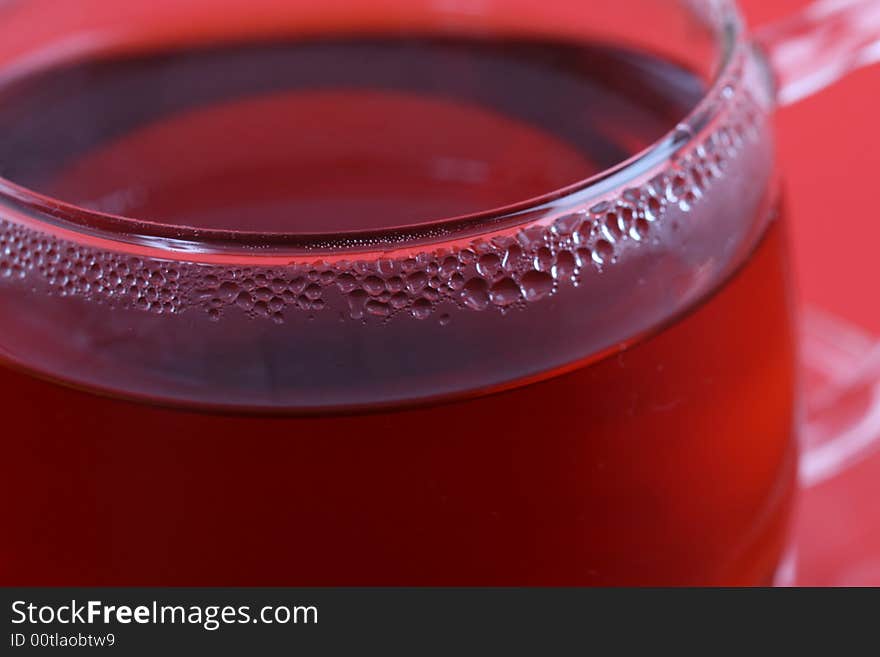 Cup of tea on a red