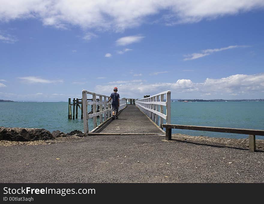 Child on ferry wharf on Rangitoto Island, New Zealand. Child on ferry wharf on Rangitoto Island, New Zealand