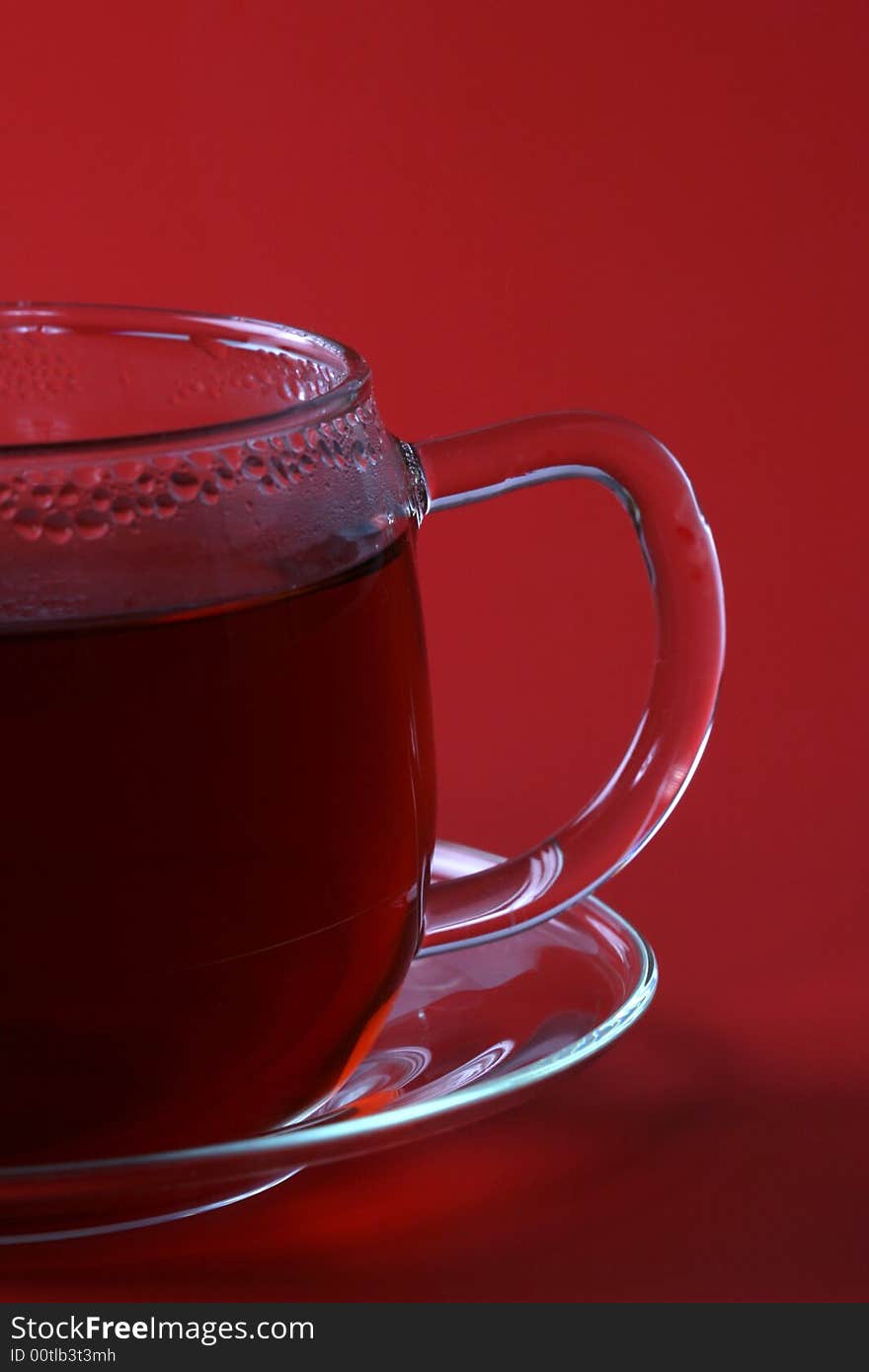 Cup of tea on a red