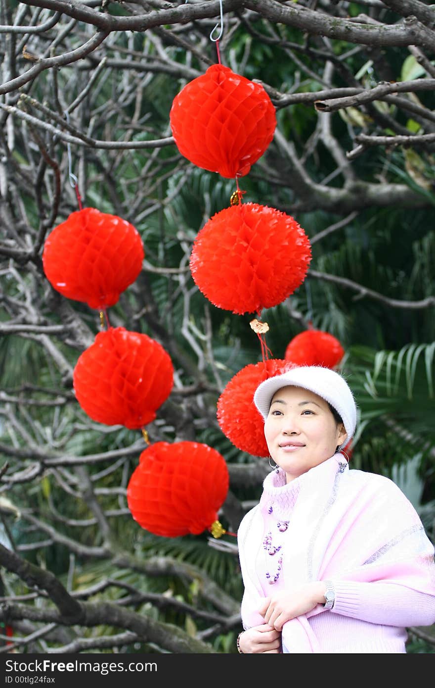 Confident chinese women is smiling.