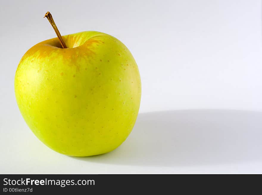 A delicious green healthy apple. A delicious green healthy apple