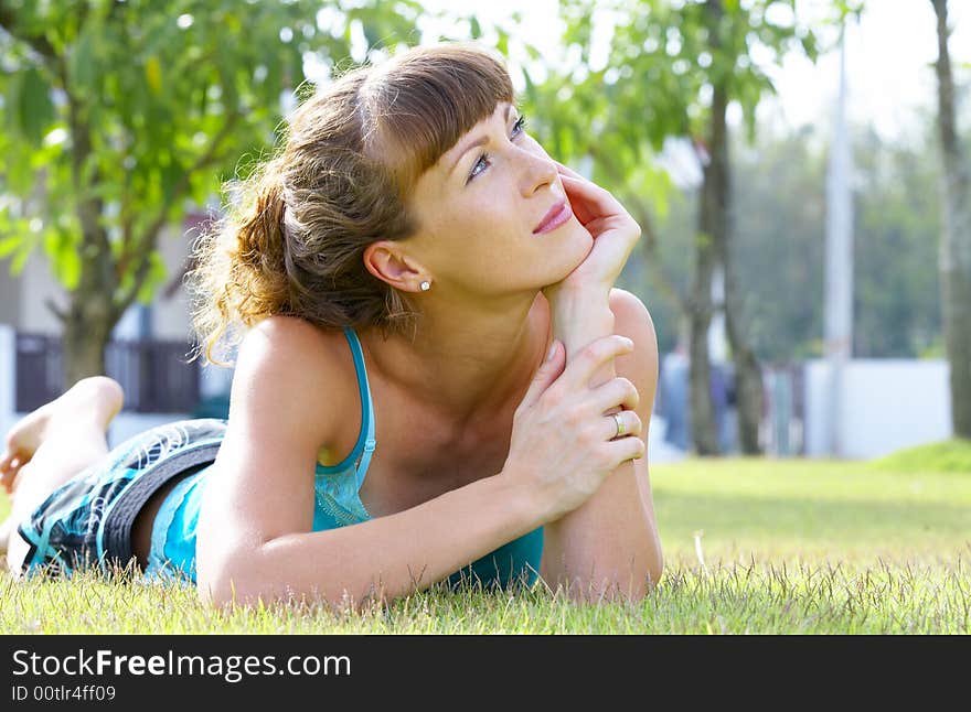 Portrait of young beautiful woman  in summer environment. Portrait of young beautiful woman  in summer environment