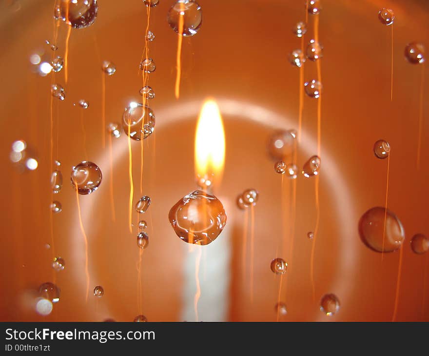 drop of water, round, yellow, abstract, small ball, fire is spark plug the orange light