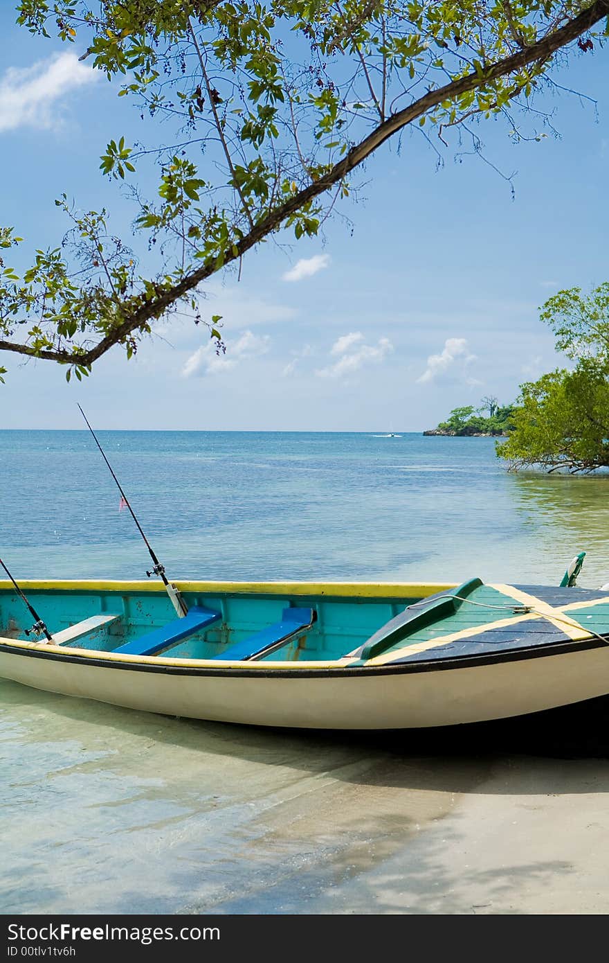 Tropical beach with boat