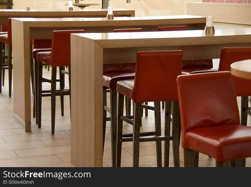 Chairs and tables at small cafe