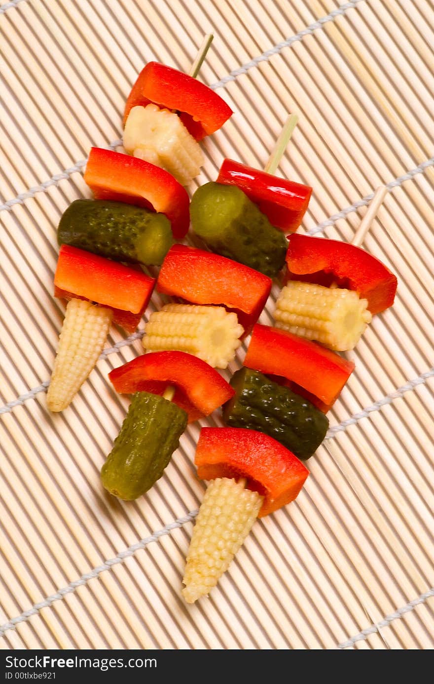 Paprika, cucumber and corn on skewers. Paprika, cucumber and corn on skewers