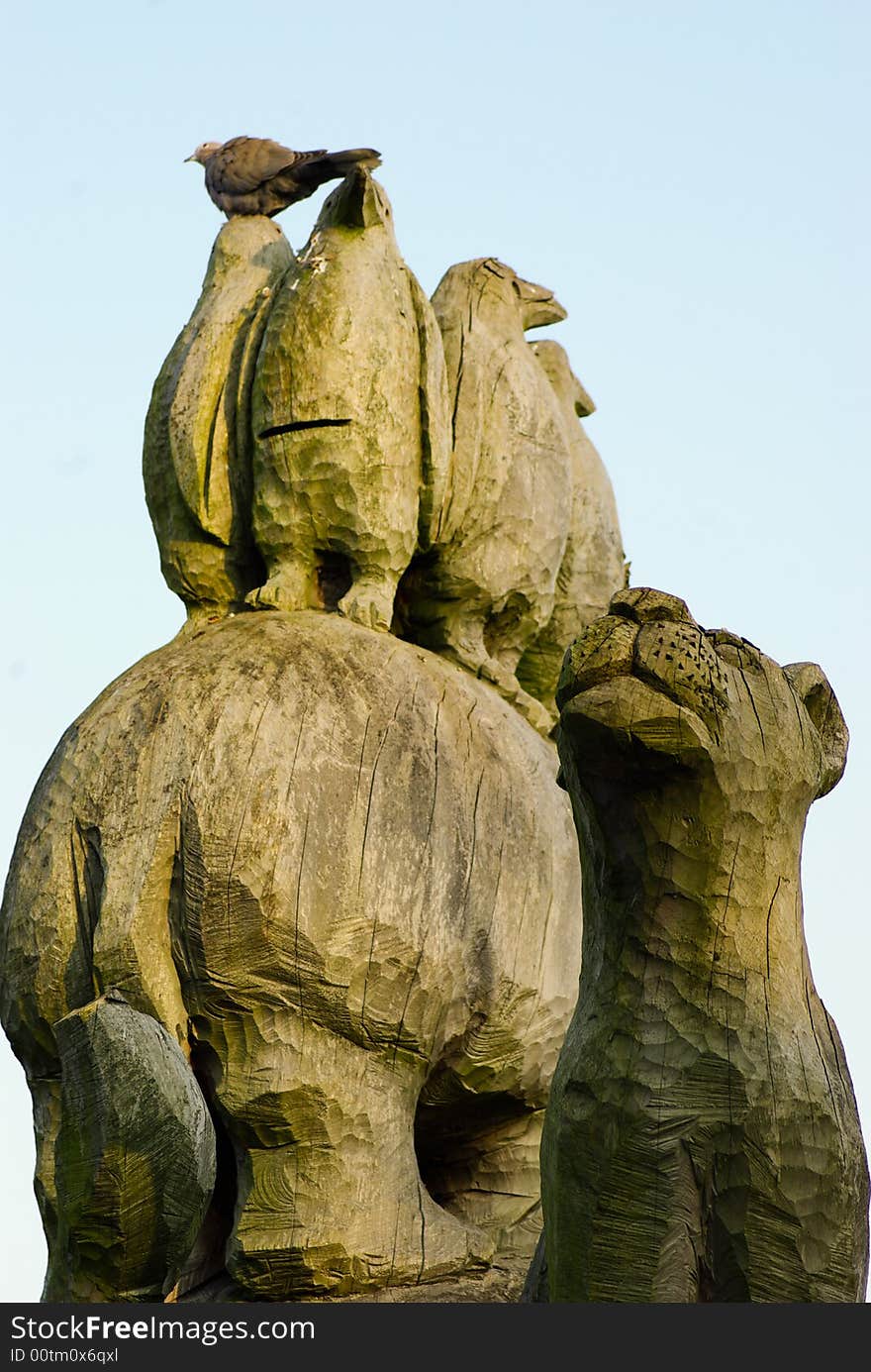 Exquisite carving of wild animals from old tree stump. Exquisite carving of wild animals from old tree stump