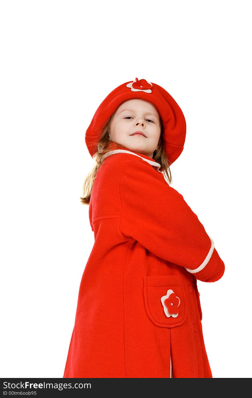 The little girl in a red coat, on the white background, isolated