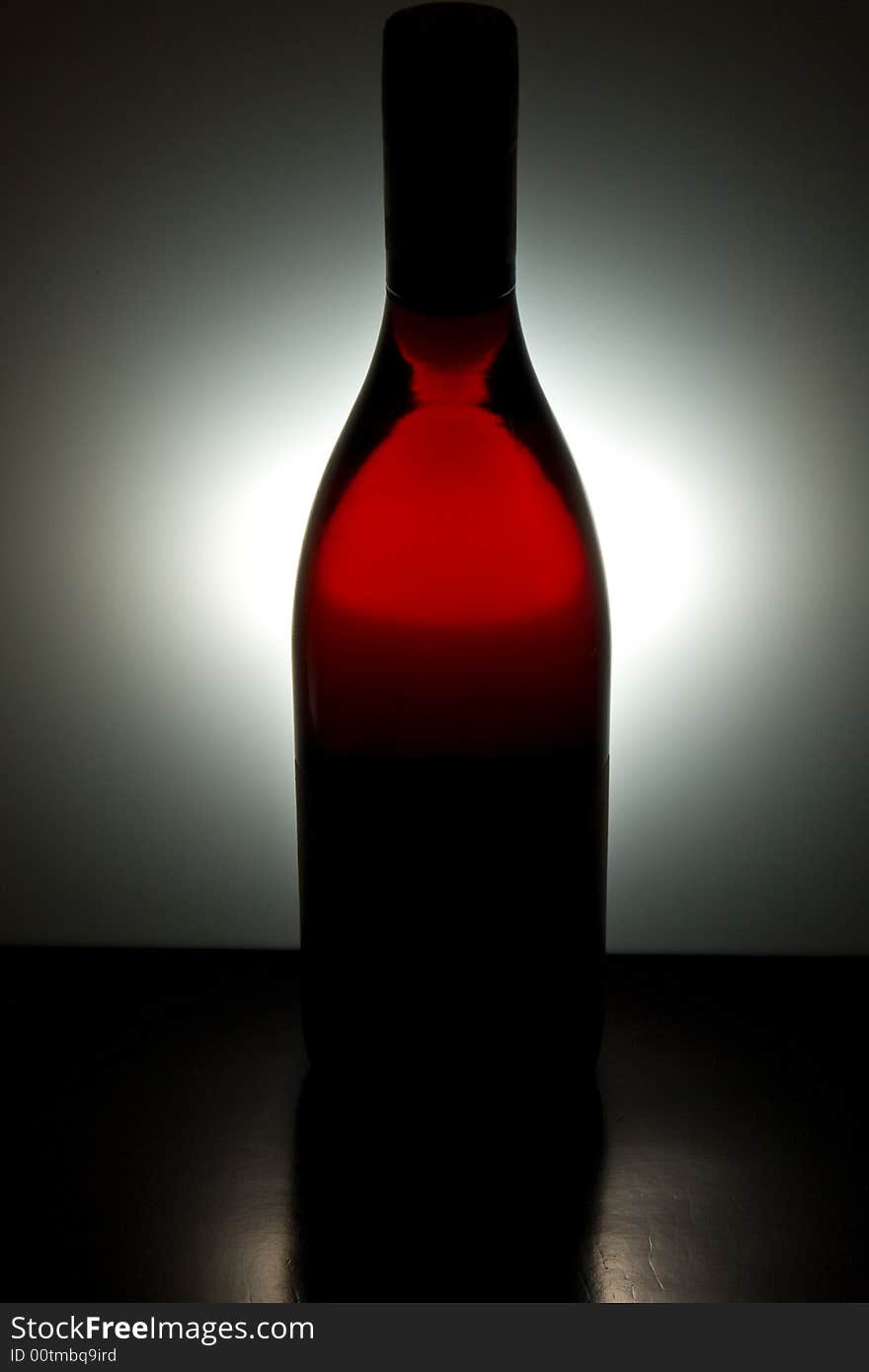 Portrait shot of a silhouetted Red Wine Bottle. Portrait shot of a silhouetted Red Wine Bottle