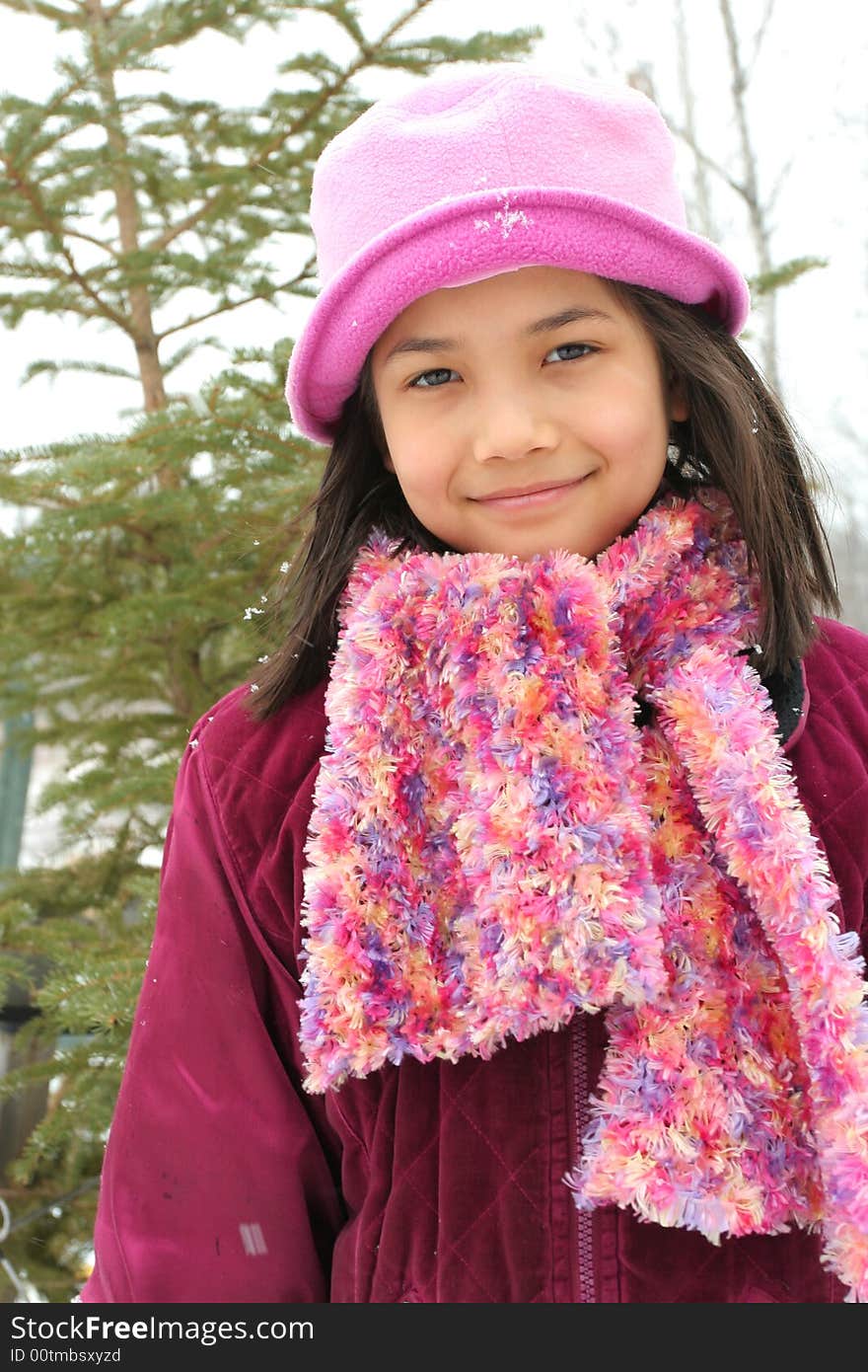 Nine year old girl enjoying winter outdoors. Nine year old girl enjoying winter outdoors