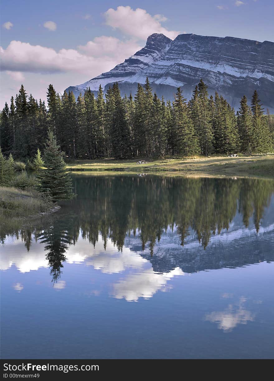 Small lake in the early cold morning in mountains of Canada. Small lake in the early cold morning in mountains of Canada