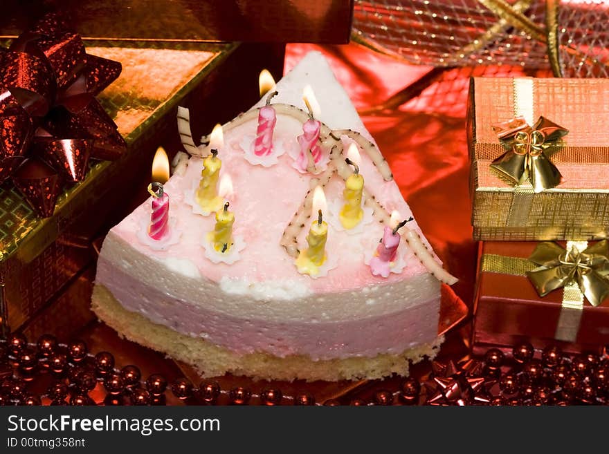 Cake and candles on celebratory table