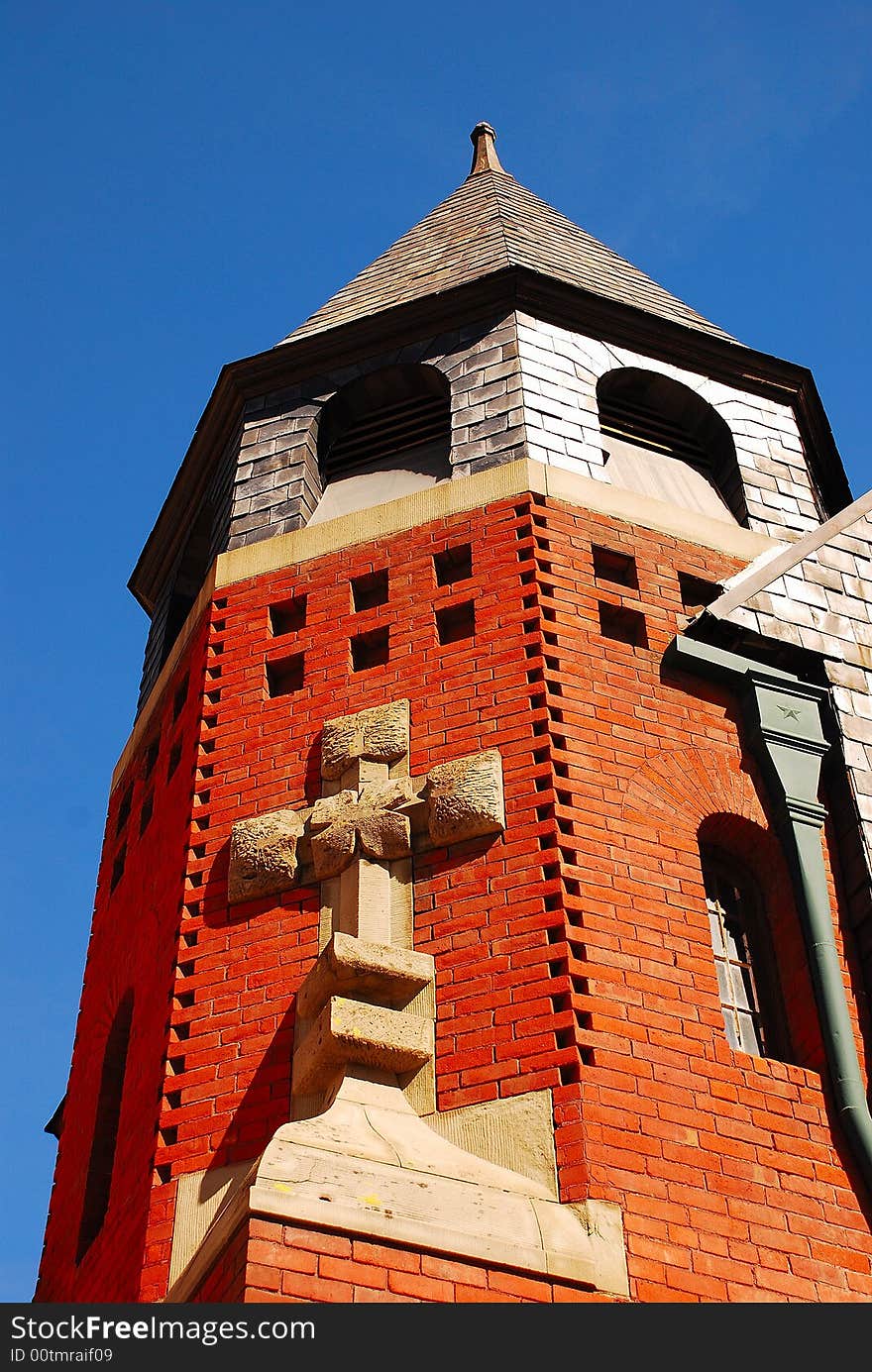 Cross on Church Bell Tower overlooking Downtown Center in Stockton, California