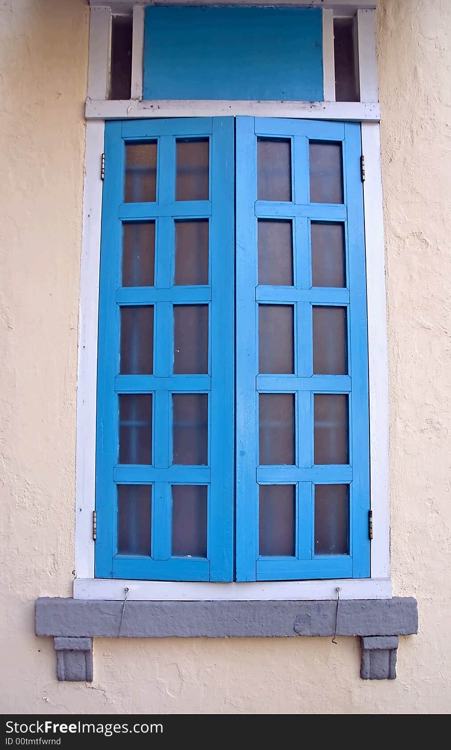 Old blue window from an old prison.