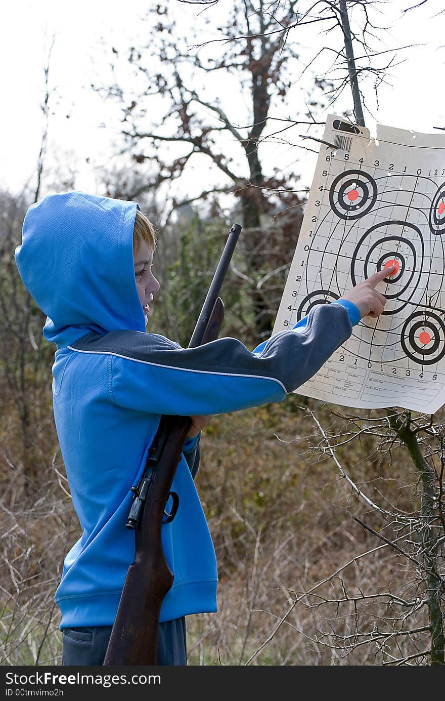 Boy checking target