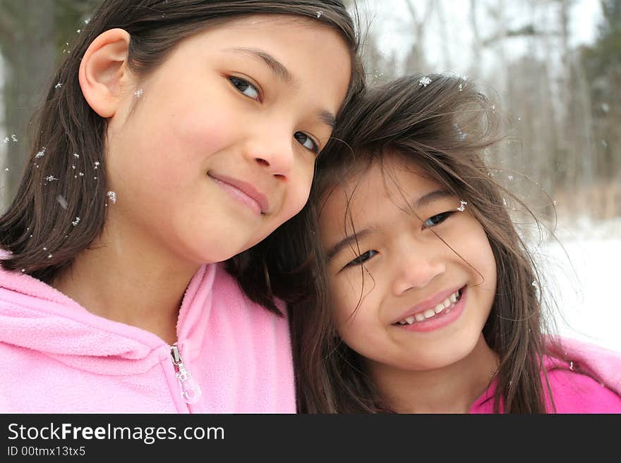 Two girls enjoying the winter