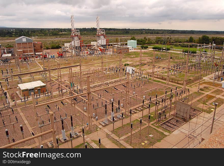 Three gas turbines with their associated transformers station. Three gas turbines with their associated transformers station