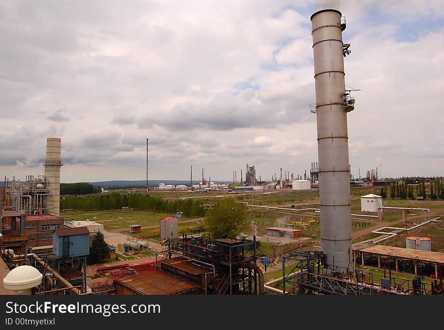 A view of a petrol refinery taken from the roof of a close power plant