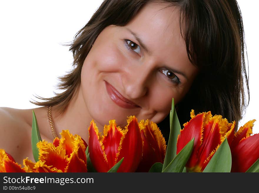 Portrait of a beautiful woman with tulips