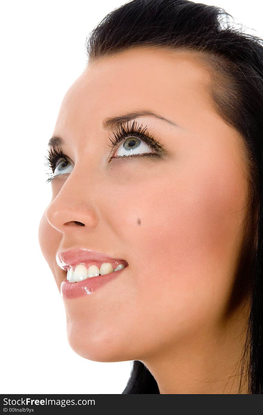 Portrait of the brunette with blue eye on white background