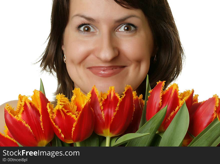 Portrait of a beautiful woman with tulips