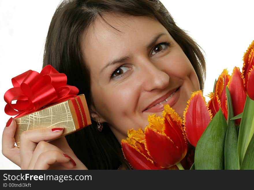 Portrait of a beautiful woman with tulips