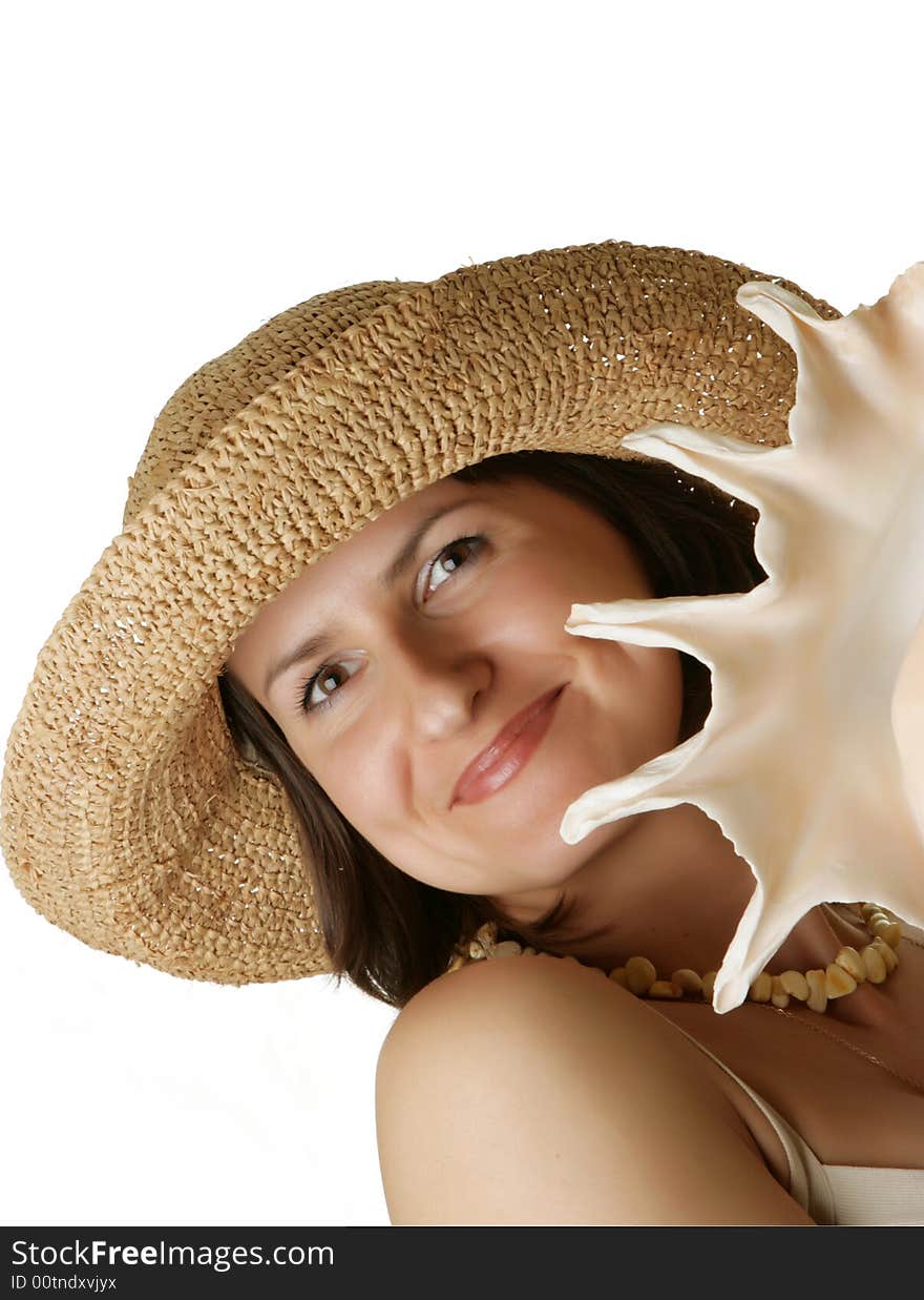 Portrait of a beautiful woman with seashell