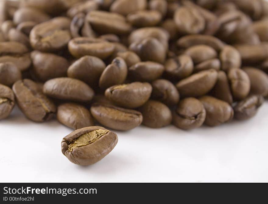 Some coffee seeds against a white background