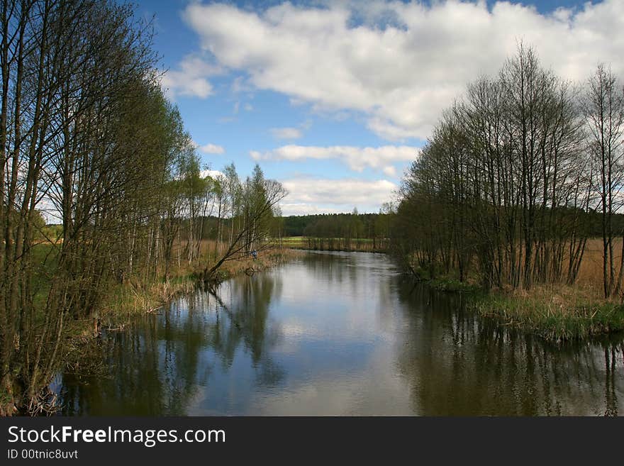 Small river and trees in early spring