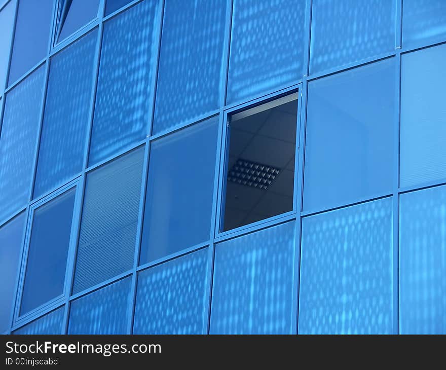 Modern office building with glass exterior, close-up. Modern office building with glass exterior, close-up