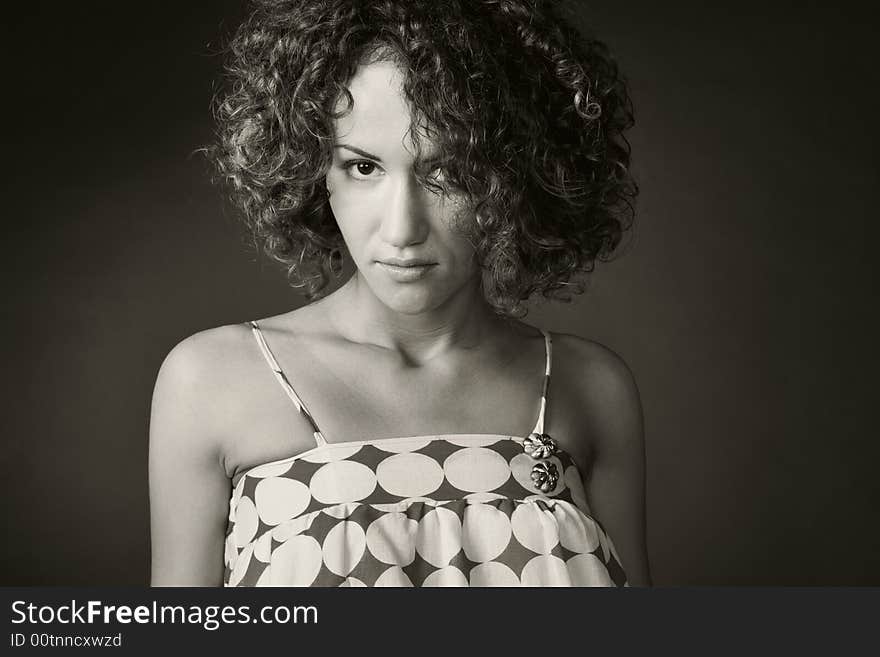 Portrait of a woman in studio on a black background