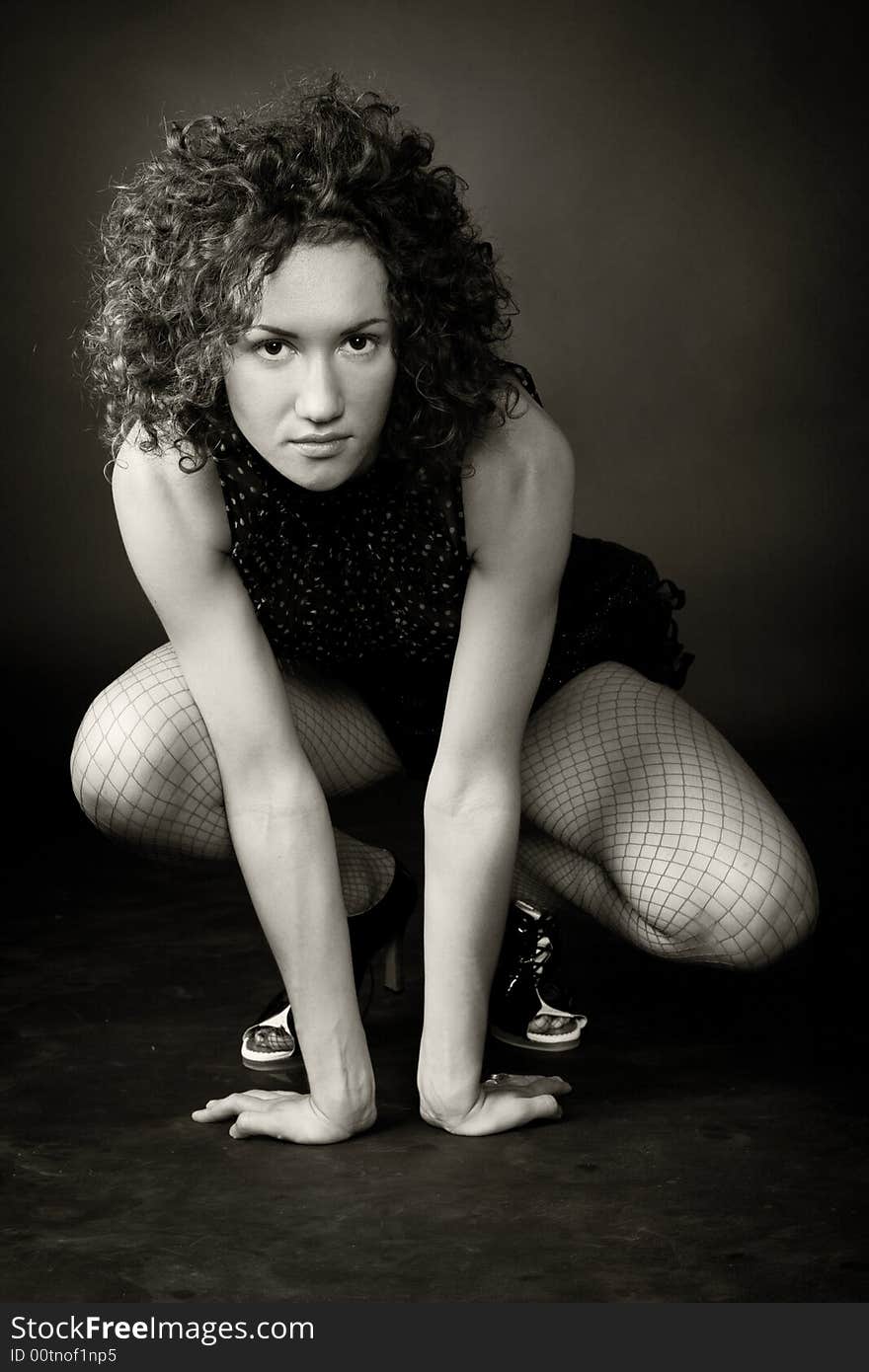 Portrait of a woman in studion on dark background