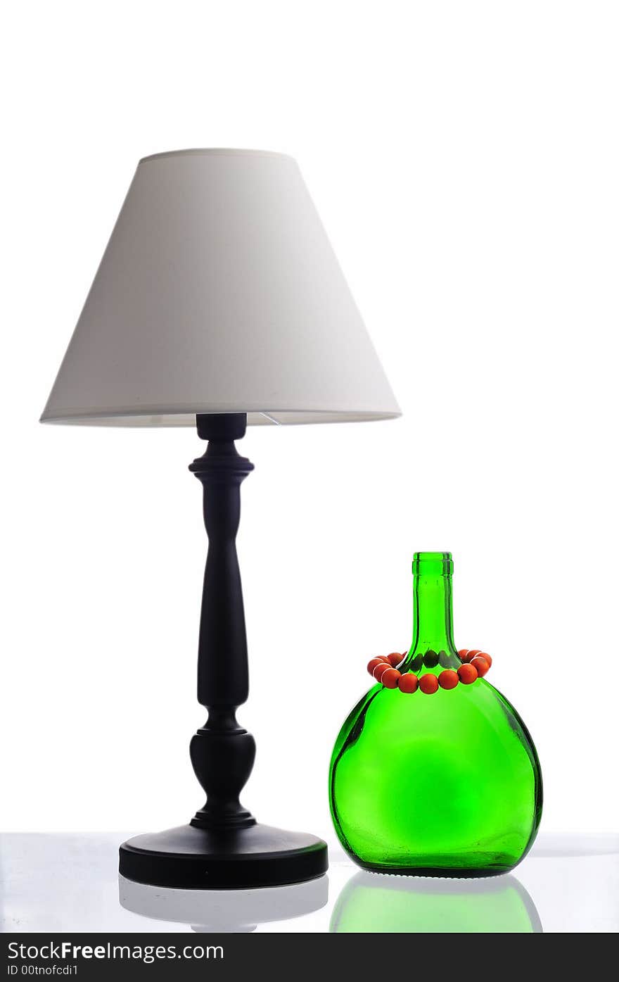 Green Bottle And White Lamp